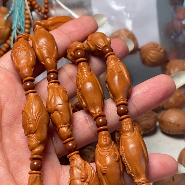 橄榄核核雕不****年站立弥勒