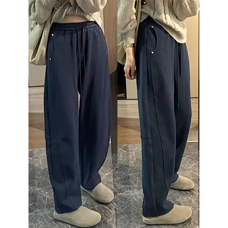 春秋休闲镰刀卫裤女2025新款韩版时尚钉珠小众设计感显瘦弯刀长裤