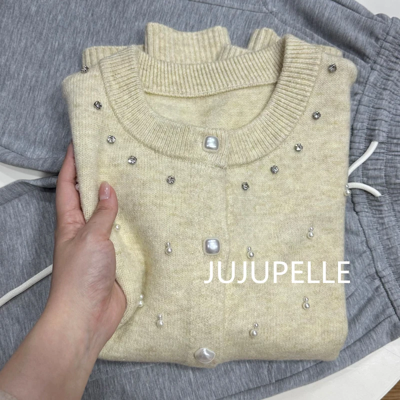 绵羊毛~2024新春款纯色星空珍珠扣开衫保暖毛衣针织衫女士上衣潮