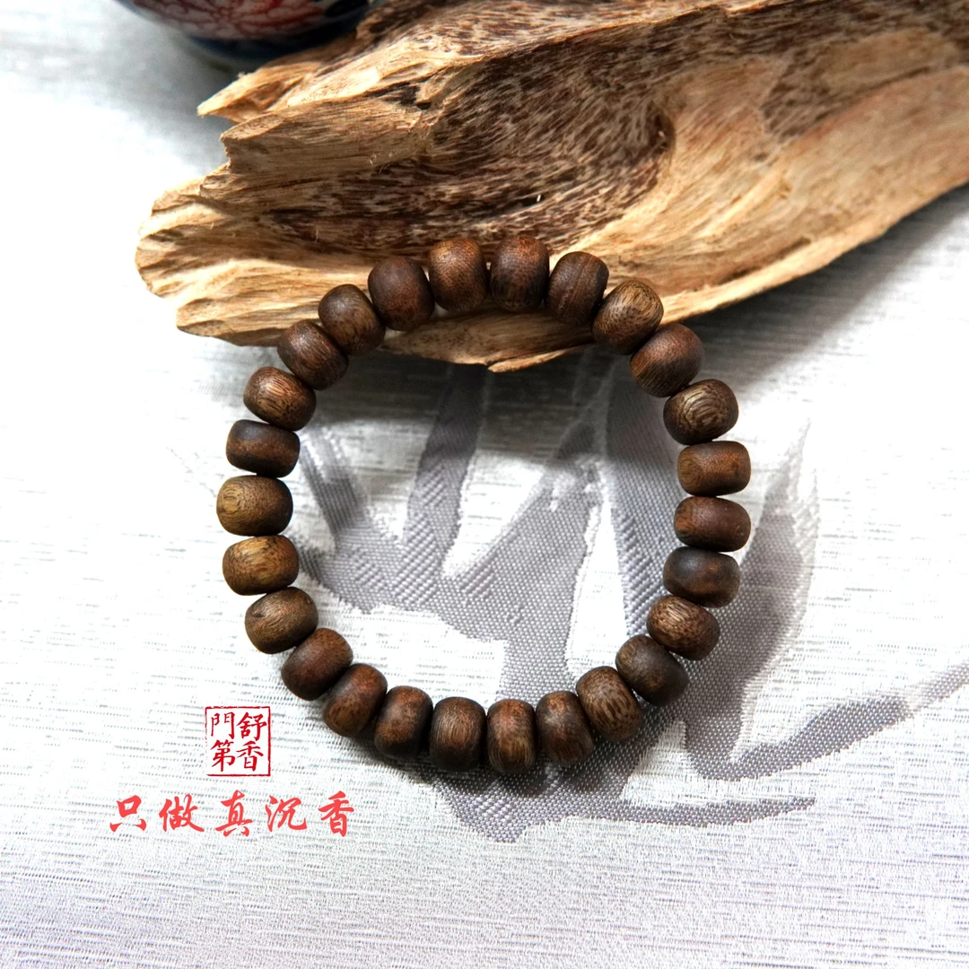 沉香0.9乌身圆叶手串算盘珠单圈7克+