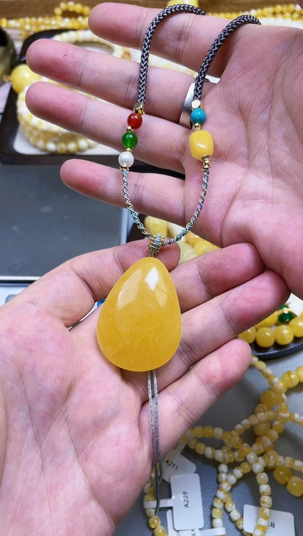 【闪购商品】蜜蜡吊坠(赠链)未镶嵌蜜蜡蜜糖红50克价