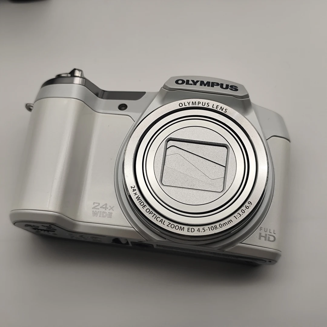 9新  奶白色ccd相机 奥林巴斯sz16 1600w像素 24倍光学长焦款