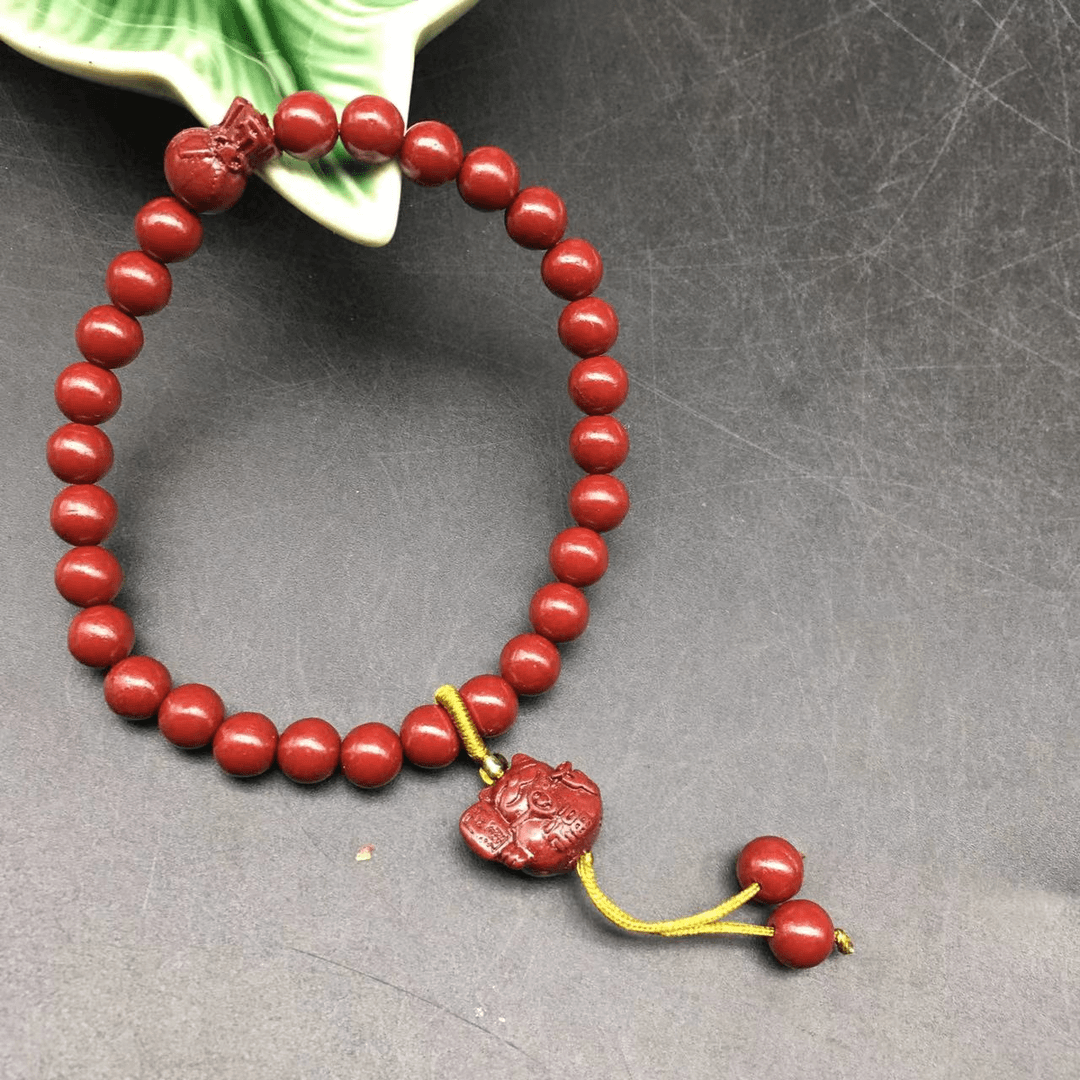 ZA222-紫金雕刻福袋招财猫提溜单圈手串6mm