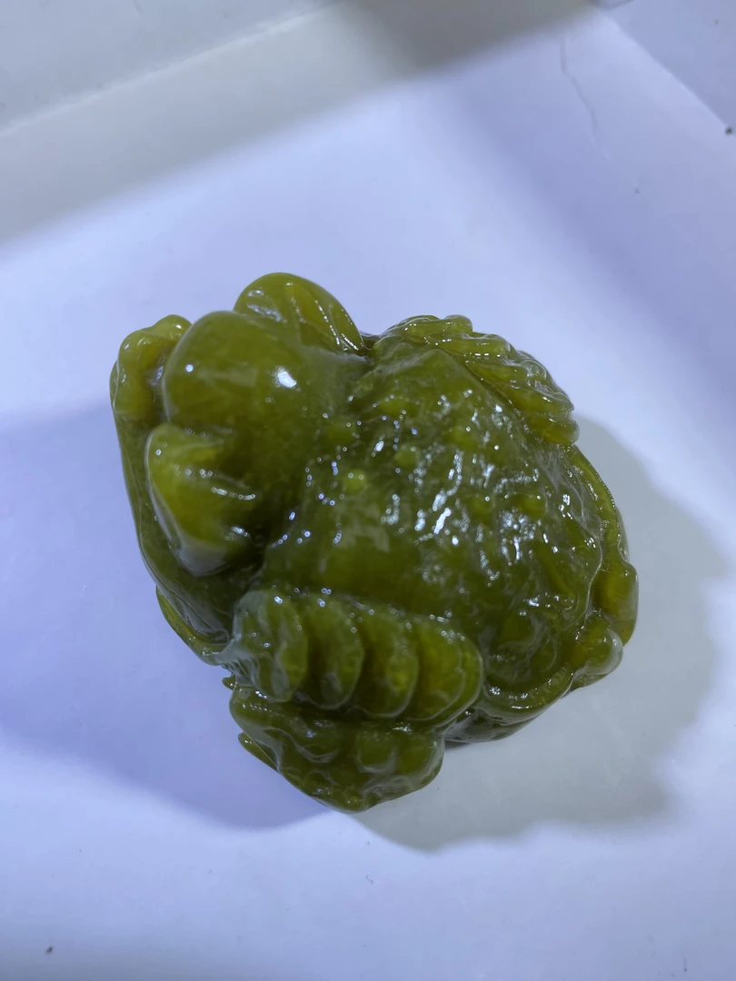 岫玉牛油果手把金蟾