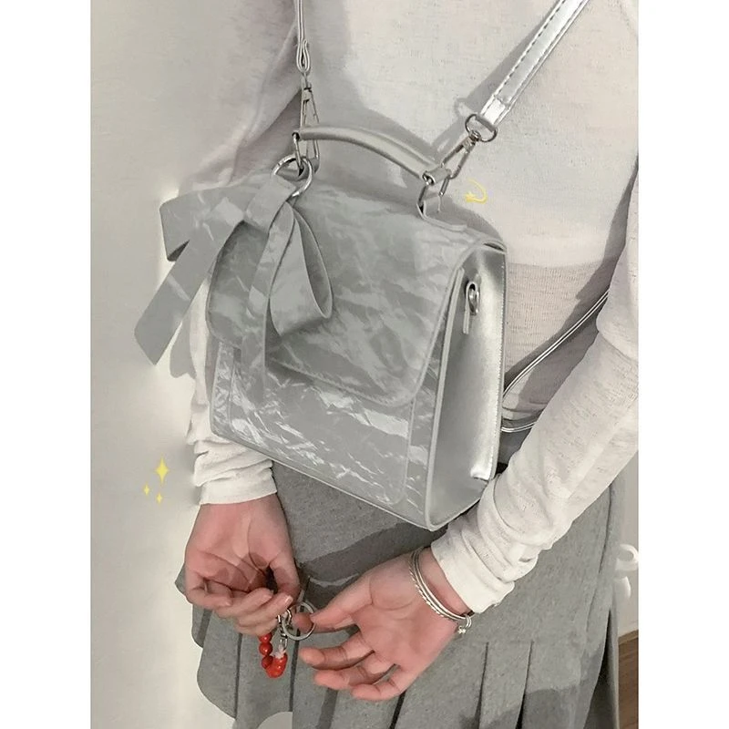 蝴蝶结双肩包包女士2024新款学院风背包百搭手提书包旅行包C1