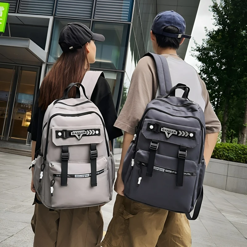 新款简约潮流大容量双肩包休闲初高中大学生尼防水户外耐脏耐磨包