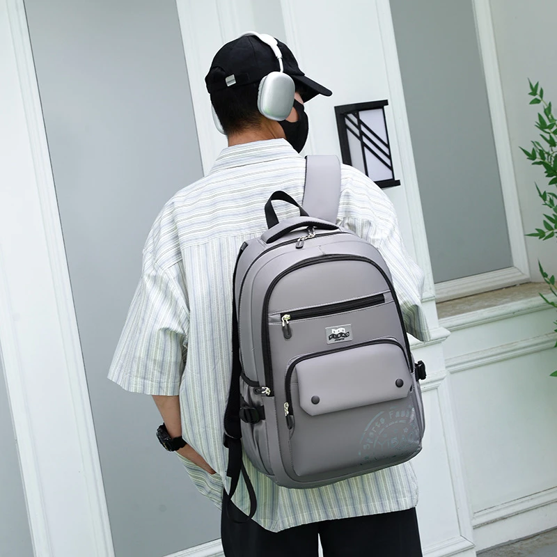 男士背包高质量旅行休闲电脑时尚潮流初高中大学生书包旅行双肩包