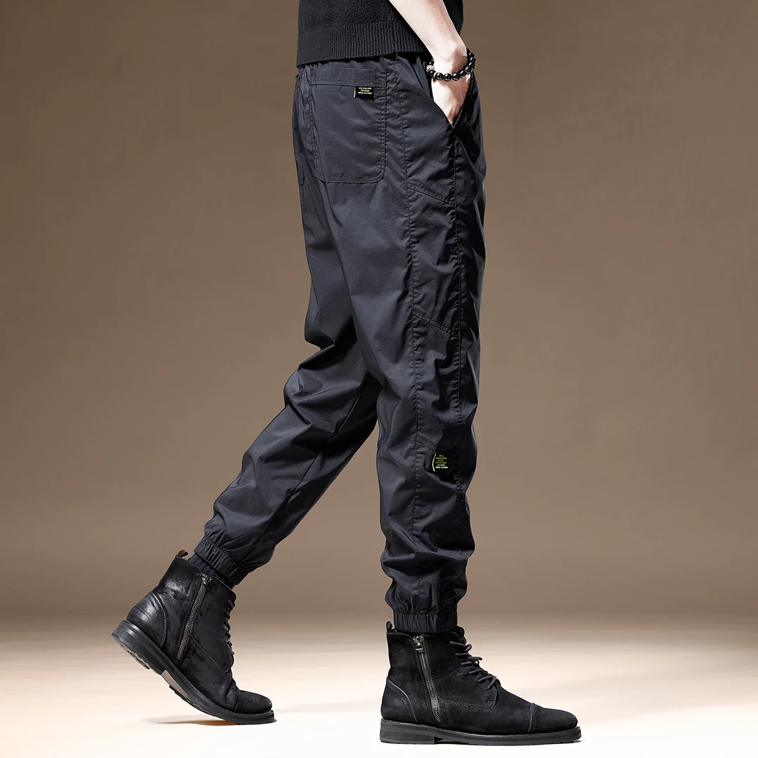 高端2025春秋新款男士休闲裤宽松大码长裤速干美式运动束脚冲锋裤