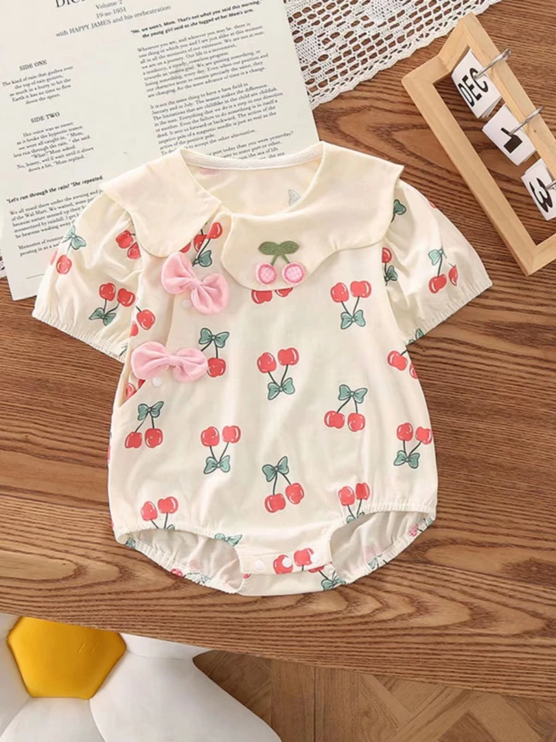 婴幼儿夏装新生儿女宝连体薄款花瓣领蝴蝶结满印樱桃连体衣外出服