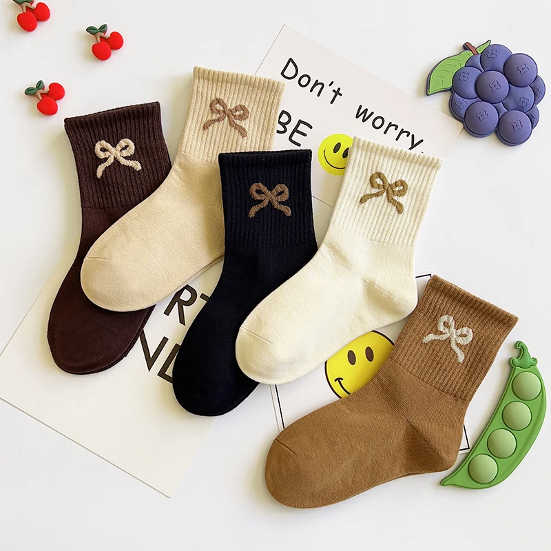 爱嘀嗒儿童中筒袜秋冬季精梳棉透气吸汗韩版蝴蝶结女宝学生运动袜