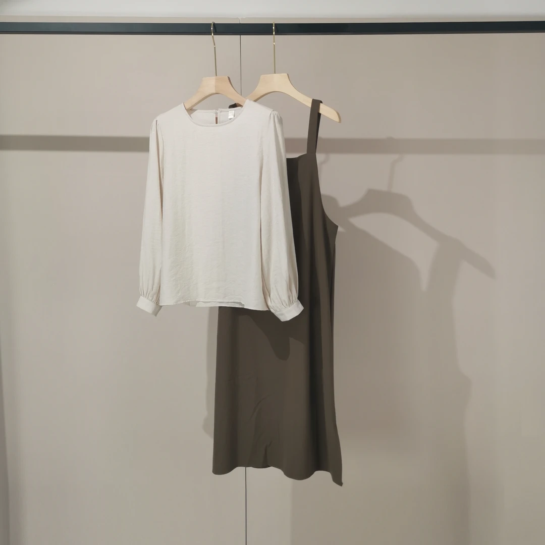 东大门百搭简约泡泡袖衬衫女九分袖宽松百搭短袖上衣时尚休闲圆领