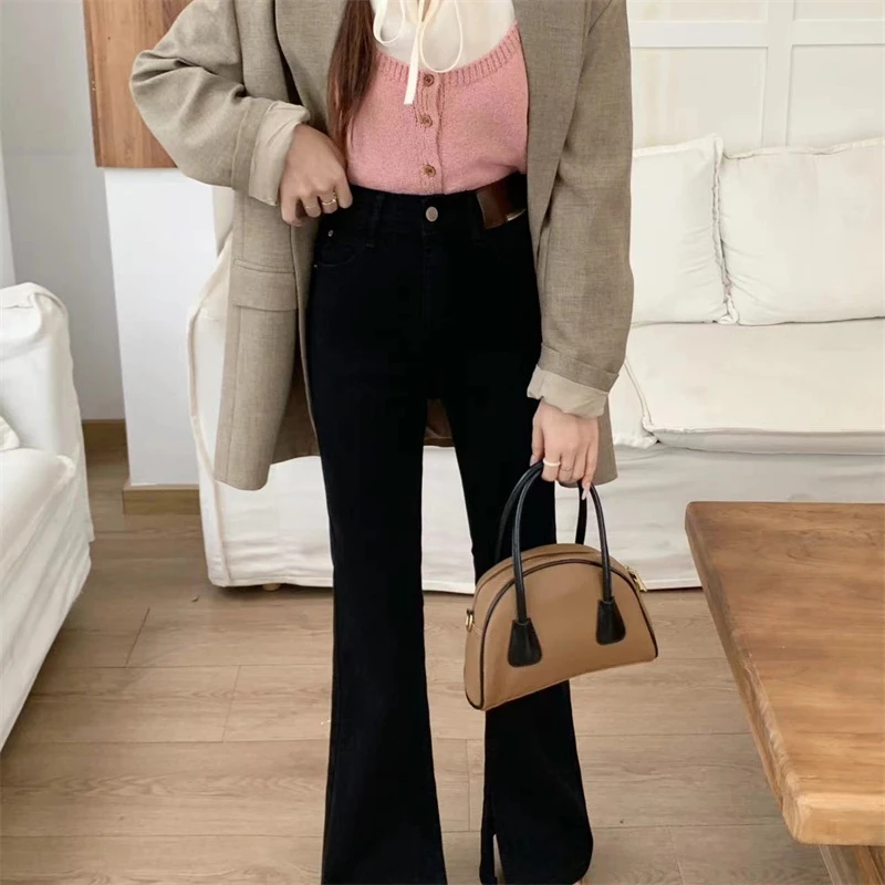 61940皮标内开叉弹力牛仔裤