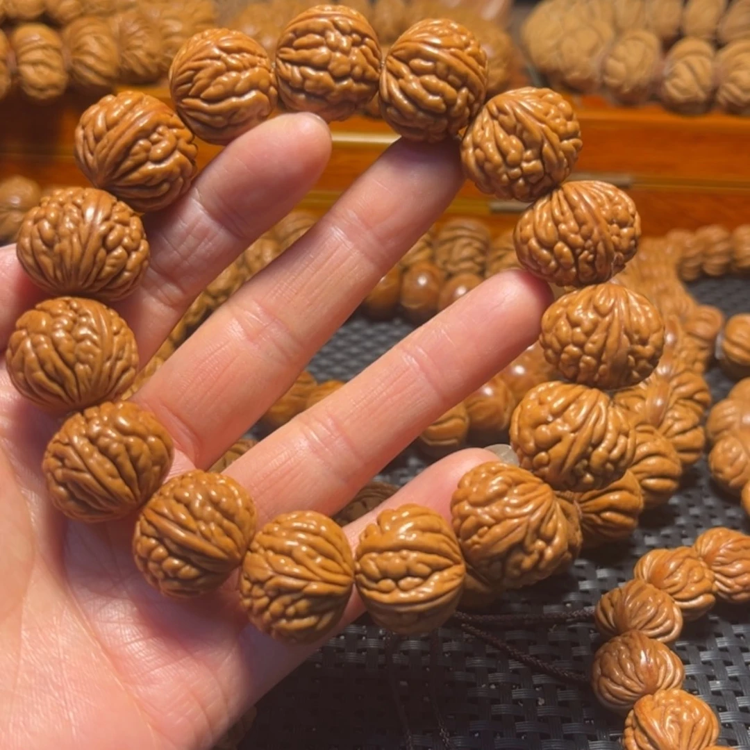 【闪购商品】桃核手串繁*。