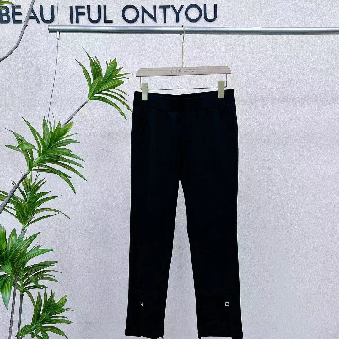 早秋直筒设计师款显瘦女裤初秋时尚百搭贴标开叉万能腰黑色直筒裤