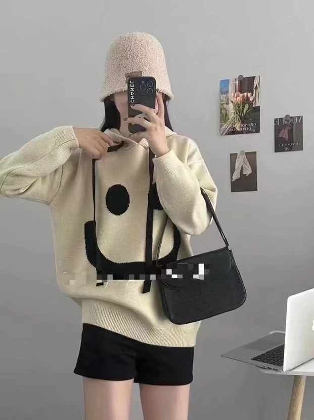 【韩衣舍】时尚潮流中长款笑脸带帽毛衣