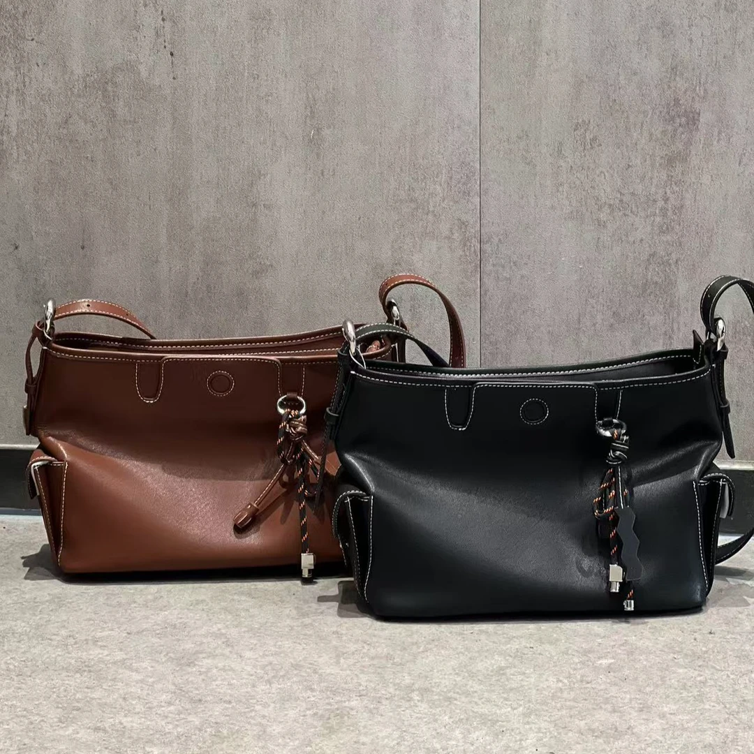 幻鲨小众轻奢时尚百搭休闲通勤真皮女士单肩托特水桶包斜跨包