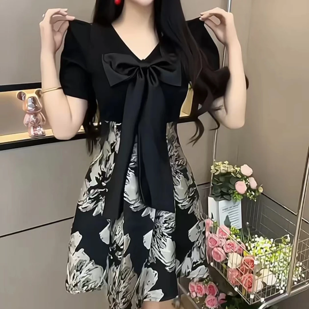 双面穿蝴蝶结连衣裙显瘦高级新款复古洋气时尚气质拼花色连衣裙女