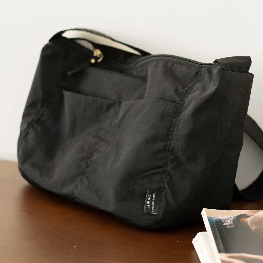 SoBag日系休闲防水尼龙斜挎单肩布包女设计感小众复古通勤饺子包