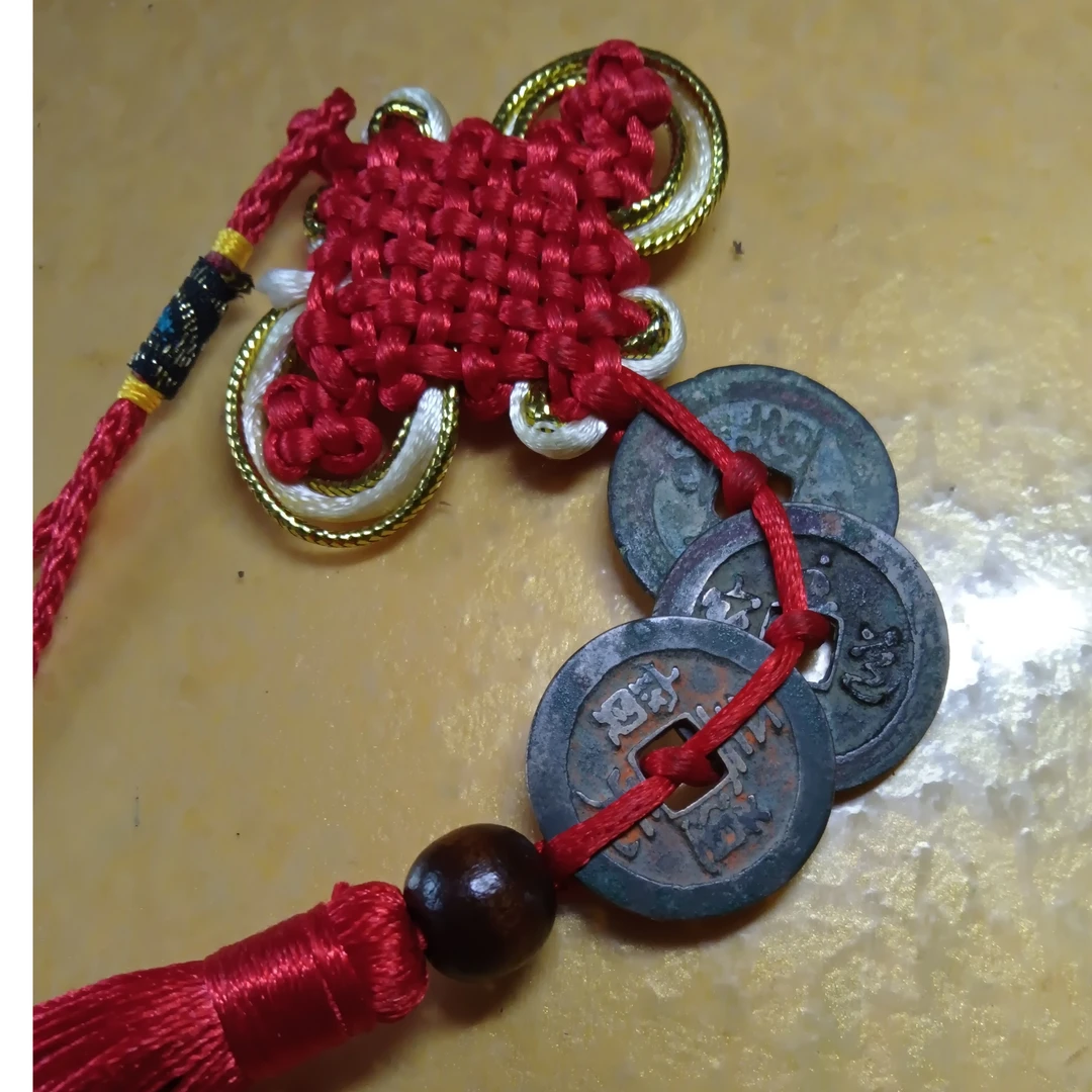 至道小佛钱至道元宝宋太宗赵光义年间发行，因其草书“至”字似佛像。