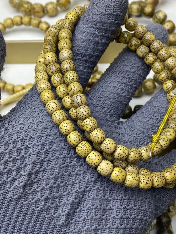 星月菩提长串108粒鸡油黄半臂河豚小细星