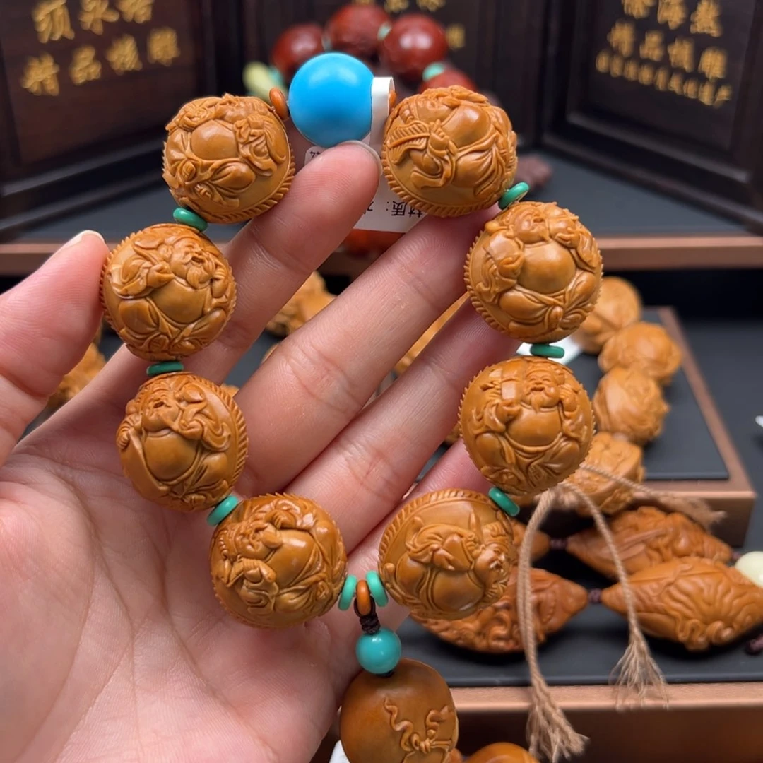 橄榄核核雕黑*子八宝财神