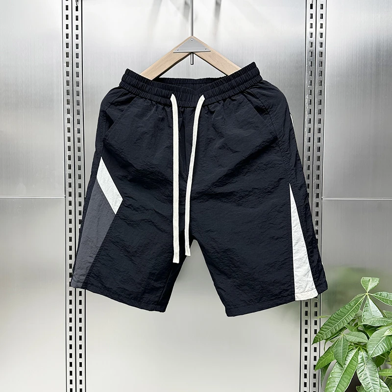 薄款夏季青年短裤男士简约沙滩裤拼接潮流简约休闲裤速干裤子