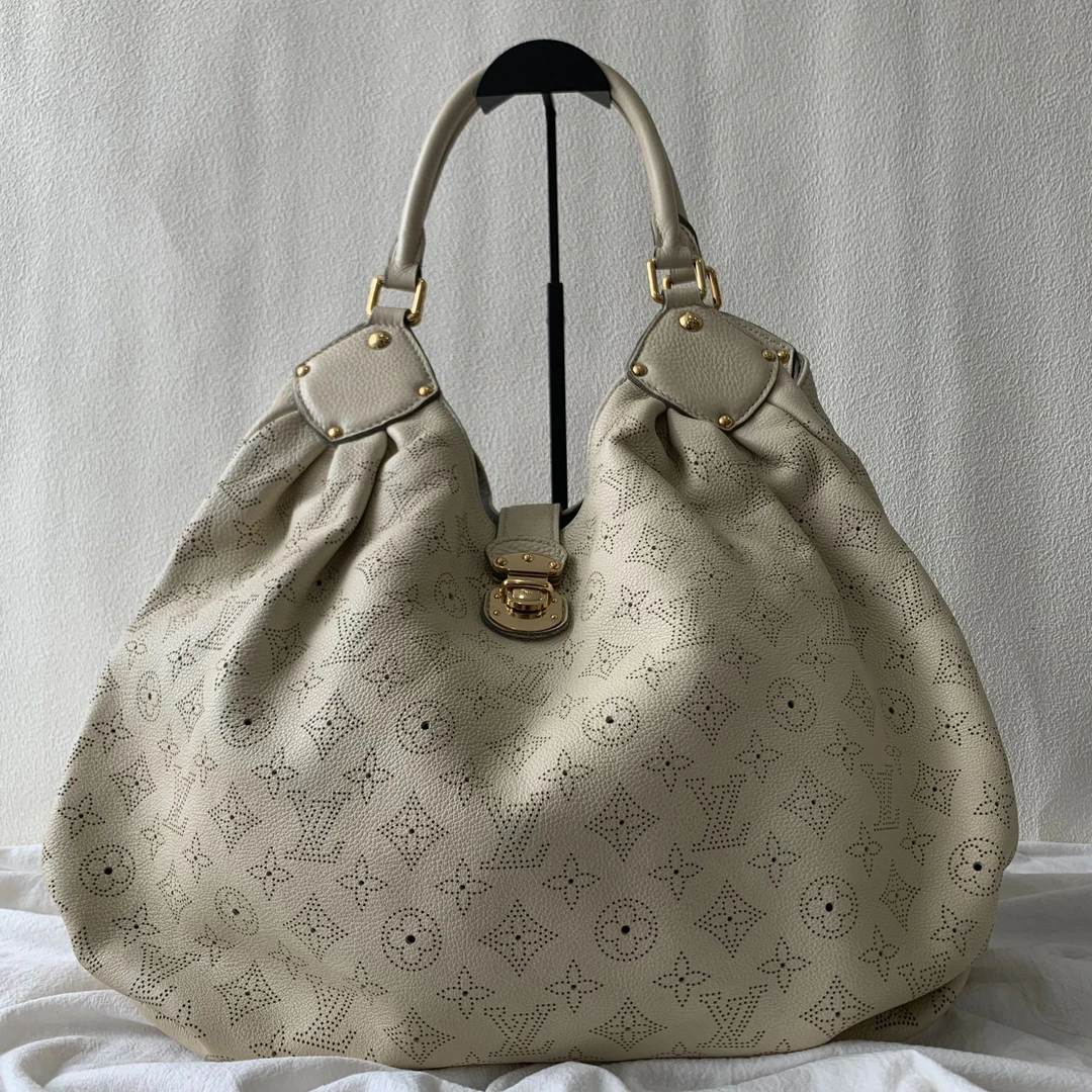 95新 LouisVuitton/路易威登 经典时尚白色镂空月光女神单肩包