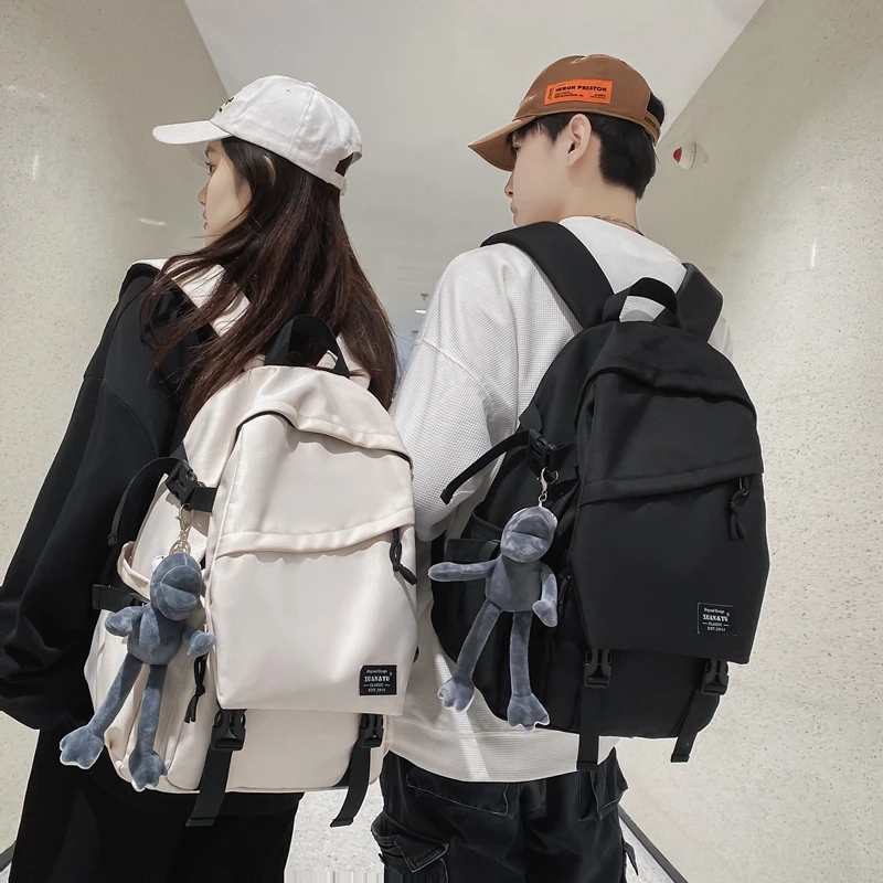 鹏杰双肩包男士简约百搭大容量电脑旅行背包女初高中大学生书包男