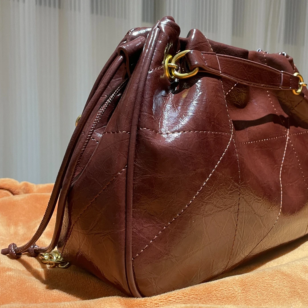 HIRMRIS手工真皮包550982-棕红  抽绳斜裂阳 29底长