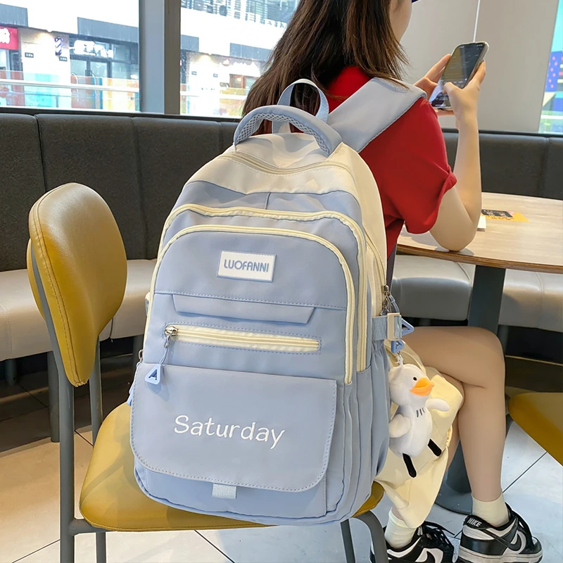 书包女大学生韩版初中生高中大容量减负双肩包男士中学生休闲背包