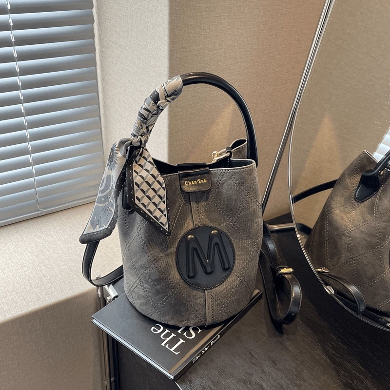 复古手提小包包抽绳斜跨潮时尚女士水桶包小众质感单肩斜挎包ELX