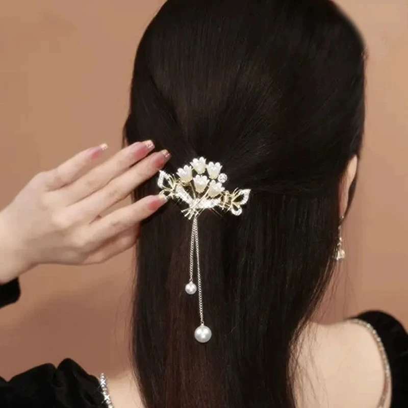 抓夹2025新款气质流苏铃兰花发夹女高级感后脑勺半扎发抓夹发饰