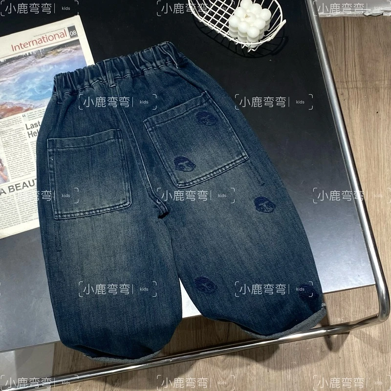 Q93秋季儿童后袋蓝色小人刺绣牛仔长裤