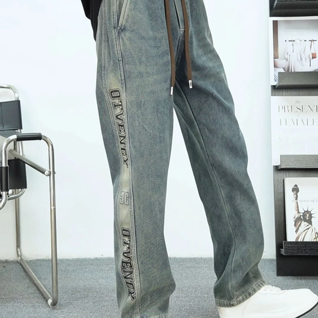 690侧边带字母加绒牛仔裤