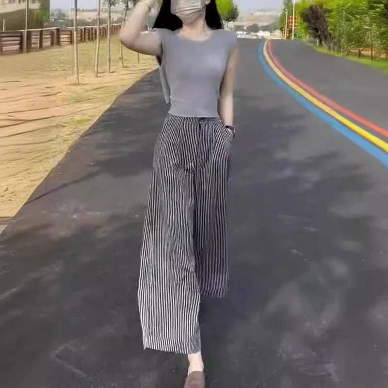 24255时尚气质潮流夏季新款纯色无袖修身上衣条纹休闲阔腿裤女