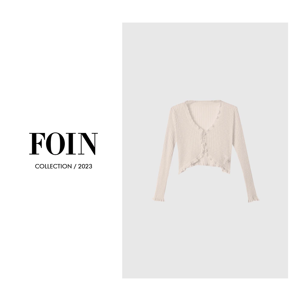 1邱肉瑶清 春季修身设计师气质镂空短款长袖针织开衫FNS23031070