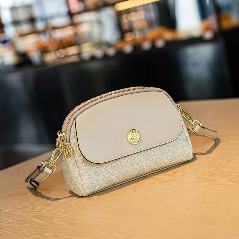 戈兰黛轻奢女包2025春夏新款多隔层斜挎包休闲百搭印花复古单肩包