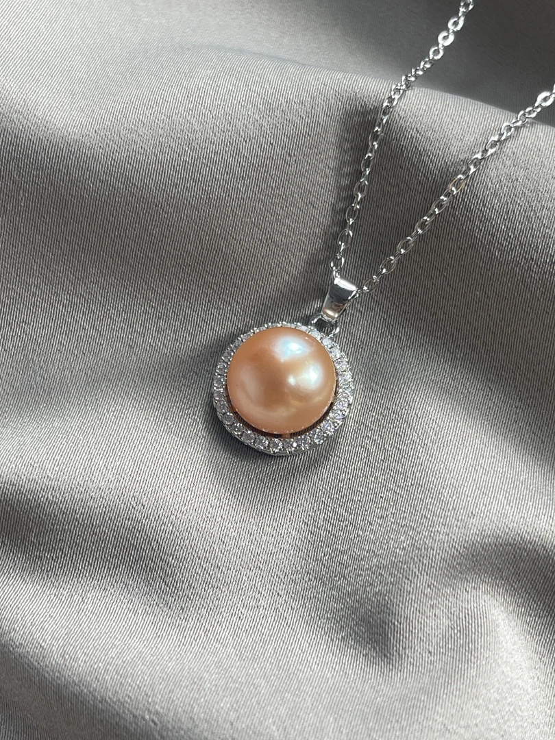 59天然珍珠环环相扣金桔吊坠