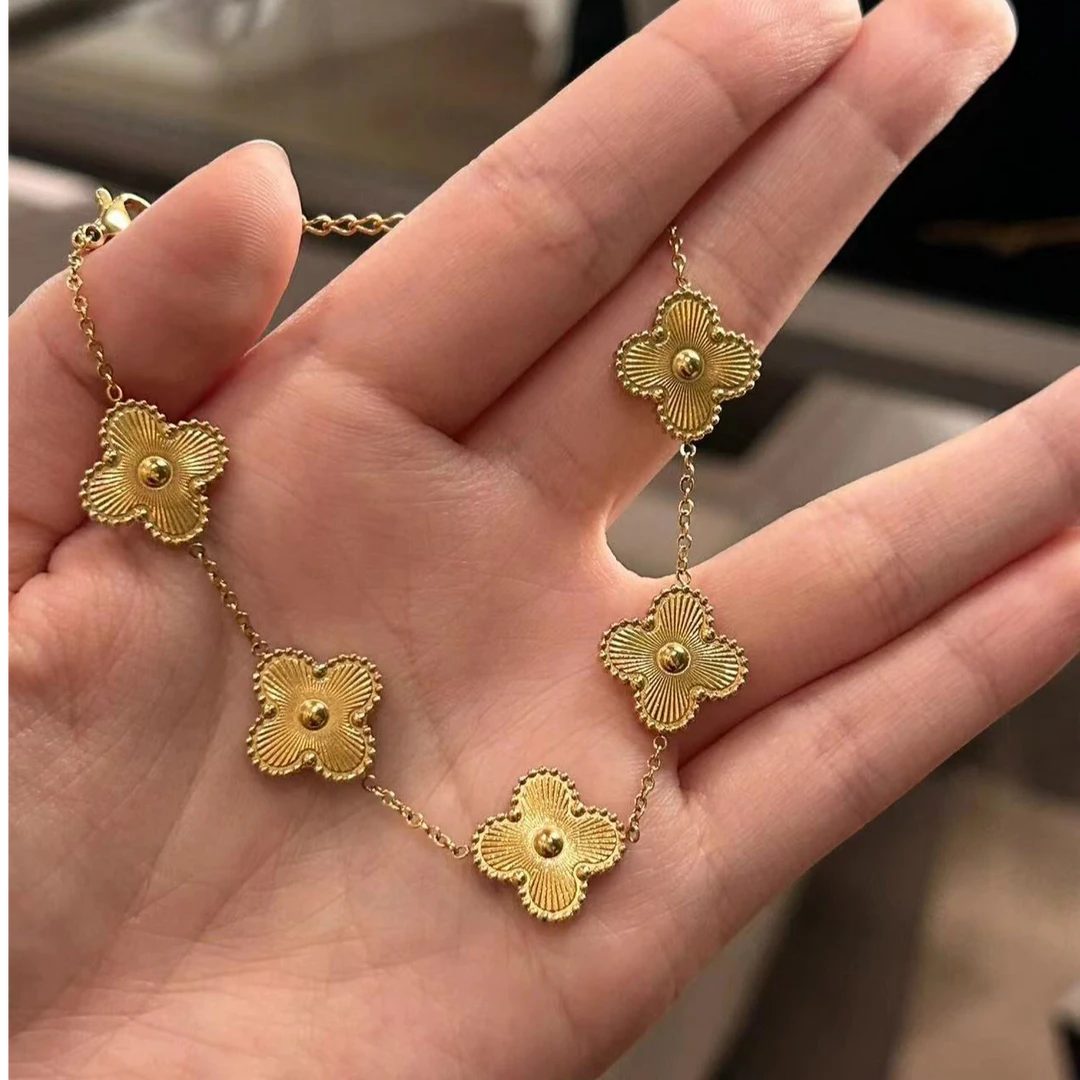 通体实心电镀k色四叶草手链28498