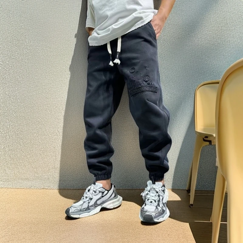 秋季水洗做旧立体裁剪束脚卫裤潮男新中式刺绣日历纯色弯刀休闲裤
