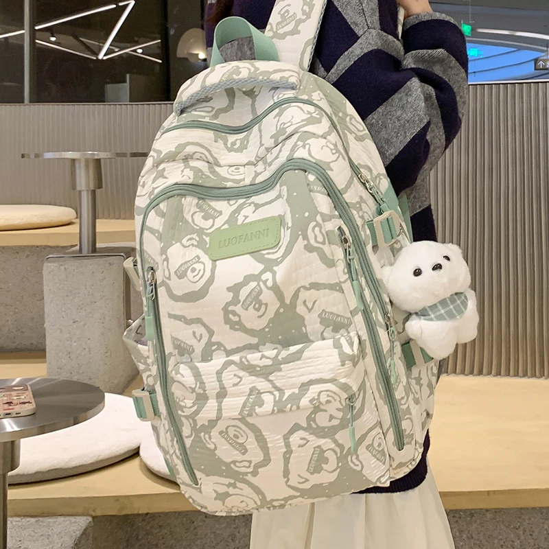 印花书包女减负轻便大容量初中生小学生可爱背包高中生电脑双肩包