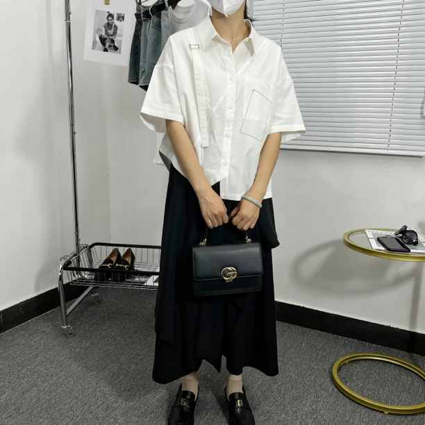 2023夏新款明线口袋小众拼接个性原创设计短袖衬衫女显瘦气质上衣