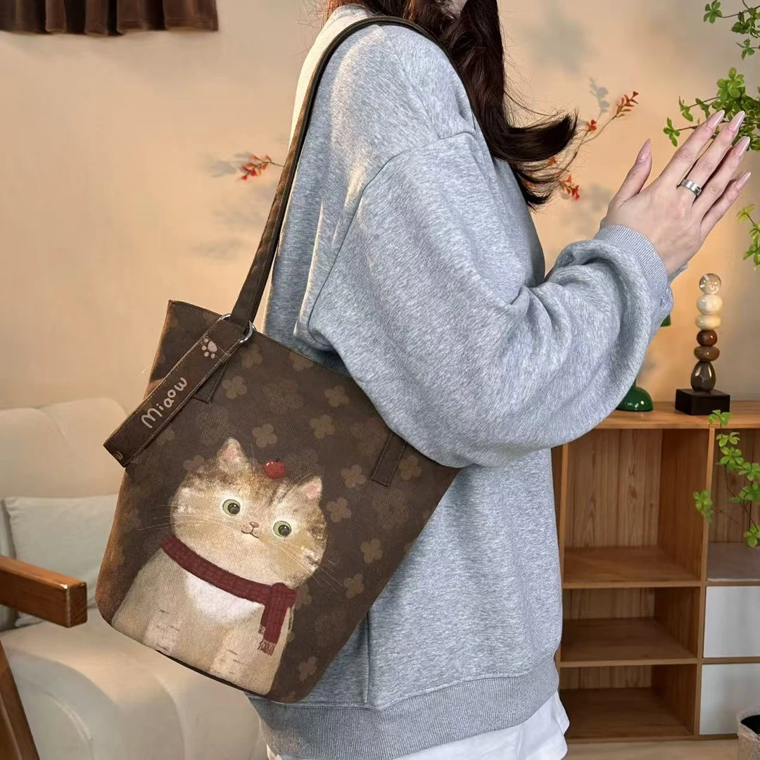 弘娜 原创新款围巾猫单肩手提斜跨水桶包休息文艺通勤包包AI