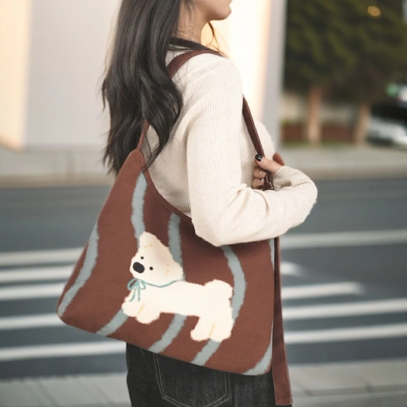 弘娜2025年新款春夏原创文艺设计师款斜挎单肩包女百搭小众包包AC