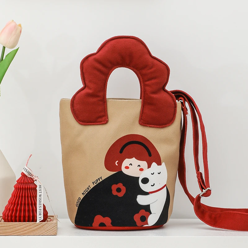 弘娜X小雪丽 原创搞怪表情时尚手提单肩水桶包印花斜挎包包女通勤