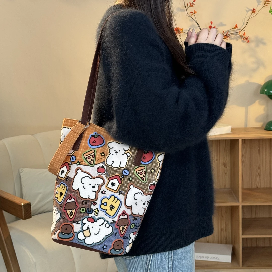 弘娜x南空直美 原创新款甜品小狗细肩带水桶包休闲文艺通勤包包