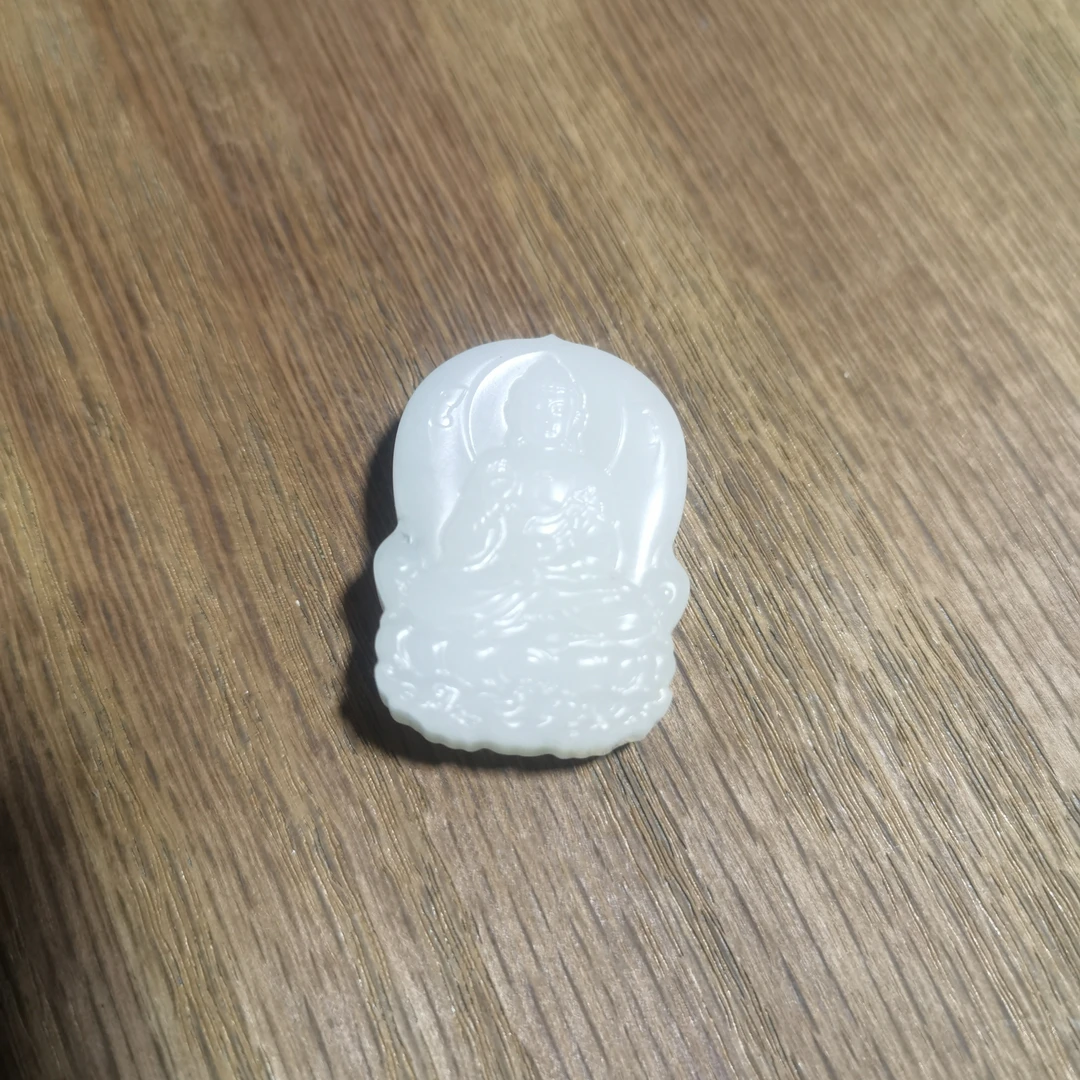 新疆和田羊脂白玉双面雕刻观音牌