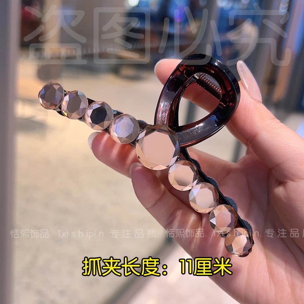1052韩版轻奢圆形水晶抓夹发夹2024新款时尚后脑勺盘发高级感发饰