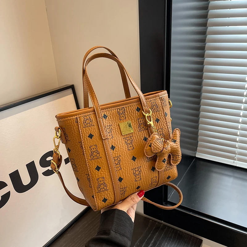 爆款网红轻奢菜篮子包包女2025新款时尚百搭斜挎包洋气手提单肩包