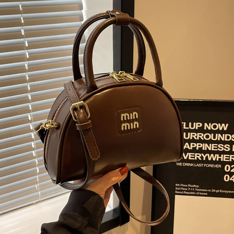 美拉德复古手提保龄球包包女2023纯色新款潮韩版枕头包百搭斜挎包